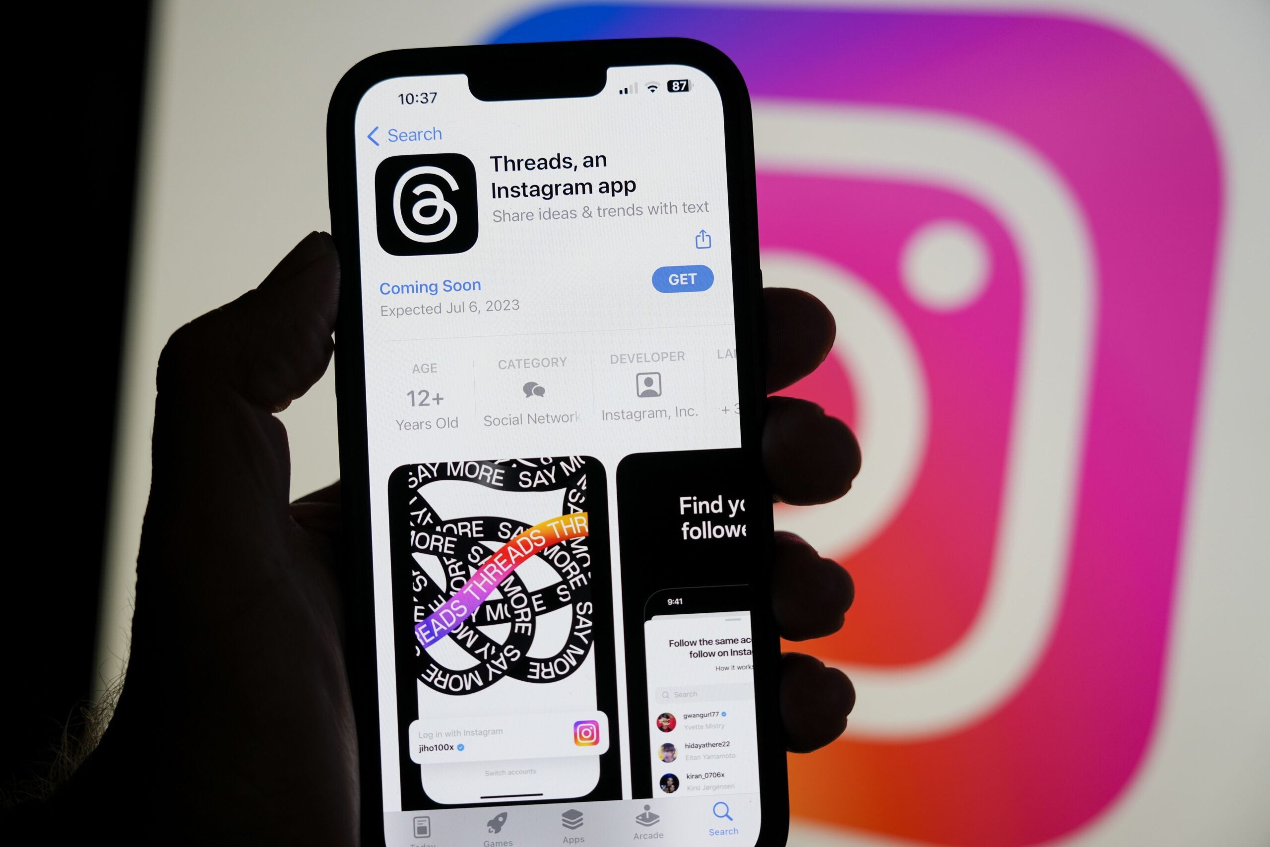 The Threads app, operated by Meta Platforms, on a smartphone, beside an Instagram logo.