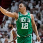 Boston Celtics forward Grant Williams (12) gestures to his teammates during the first half of Game 4 during the NBA basketball playoffs Eastern Conference finals against the Miami Heat, Tuesday, May 23, 2023, in Miami.