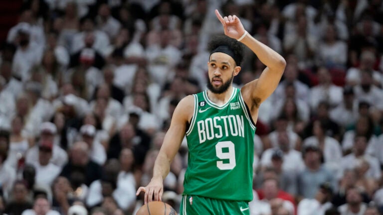 Boston Celtics guard Derrick White (9) gestures during Game 4 of the NBA basketball playoffs Eastern Conference finals against the Miami Heat, Tuesday, May 23, 2023, in Miami.