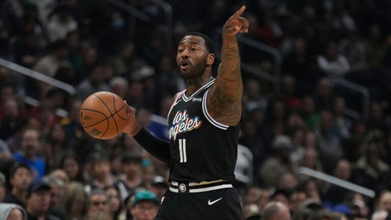 Los Angeles Clippers guard John Wall dribbles during an NBA basketball game against the Denver Nuggets Friday, Jan. 13, 2023, in Los Angeles.