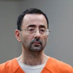 Larry Nassar appears in court for a plea hearing in Lansing, Mich.