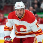 Calgary Flames left wing Milan Lucic (17) plays against the Detroit Red Wings in the first period of an NHL hockey game Thursday, Feb. 9, 2023, in Detroit.