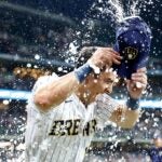 MILWAUKEE, WISCONSIN - JULY 22: Sal Frelick #10 of the Milwaukee Brewers gets a gatorade shower after the win against the Atlanta Braves at American Family Field on July 22, 2023 in Milwaukee, Wisconsin.