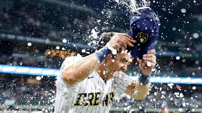 MILWAUKEE, WISCONSIN - JULY 22: Sal Frelick #10 of the Milwaukee Brewers gets a gatorade shower after the win against the Atlanta Braves at American Family Field on July 22, 2023 in Milwaukee, Wisconsin.