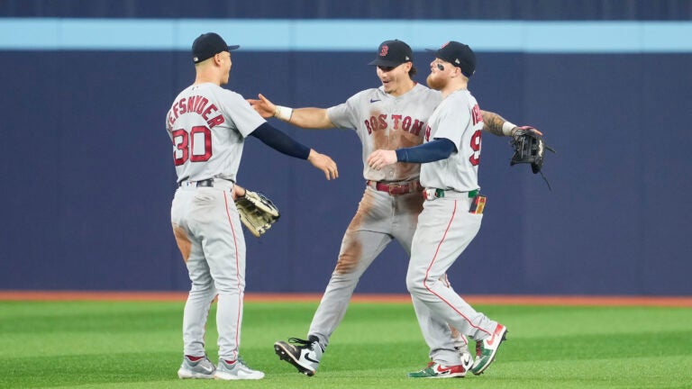 Alex Verdugo of the Boston Red Sox reacts with Jarren Duran after News  Photo - Getty Images