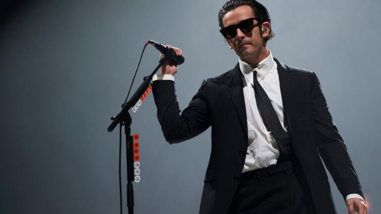 FILE - Matty Healy of the 1975 performs at the Reading Music Festival, England, Sunday, Aug. 28, 2022.