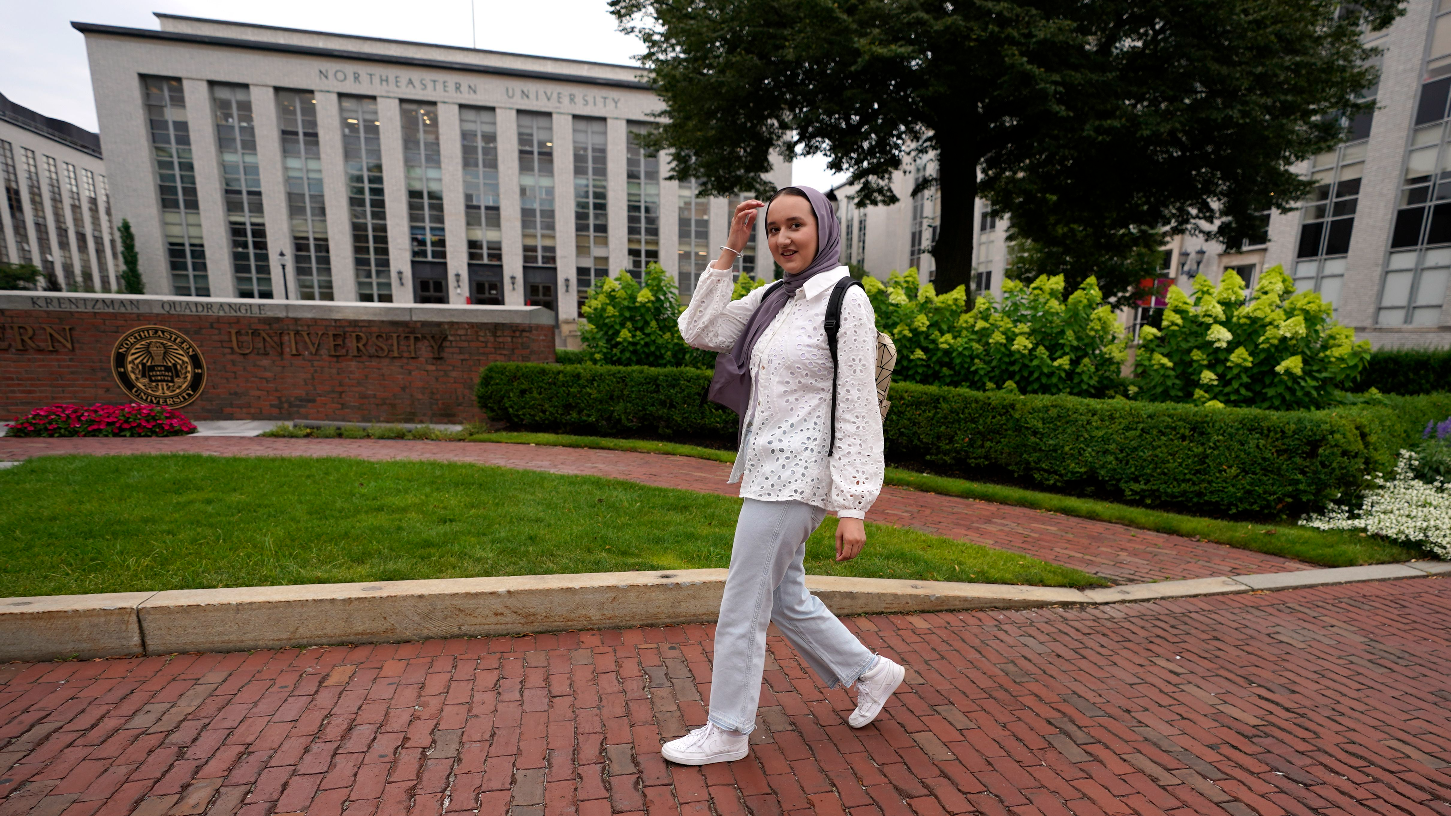 Northeastern College pupil Mashal Aziz poses on campus in Boston.