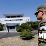 FILE - A U.S. soldier stands outside of the Peace House, the venue for the planned summit between South Korean President Moon Jae-in and North Korean leader Kim Jong Un during a press tour at the southern side of the Panmunjom in the Demilitarized Zone, South Korea on April 18, 2018.