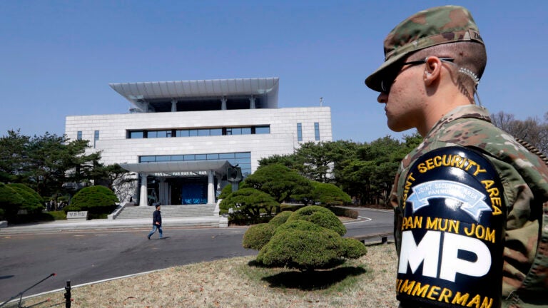 FILE - A U.S. soldier stands outside of the Peace House, the venue for the planned summit between South Korean President Moon Jae-in and North Korean leader Kim Jong Un during a press tour at the southern side of the Panmunjom in the Demilitarized Zone, South Korea on April 18, 2018.