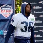 New England Patriots running back Kevin Harris (36) comes onto the field during an NFL football practice, Friday, July 28, 2023, in Foxborough, Mass.