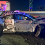 A badly damaged police cruiser