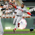 Boston Red Sox's Pablo Reyes advances to third base against the Minnesota Twins during the third inning of a baseball game, Monday, June 19, 2023, in Minneapolis.