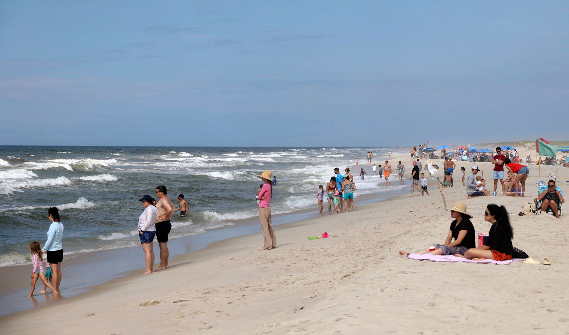 People are seen at Field 3 at Robert Moses State Park in West Islip, N.Y