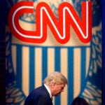 FILE - Then-Republican presidential candidate Donald Trump arrives for a CNN town hall at the University of South Carolina in Columbia, S.C., Feb. 18, 2016.