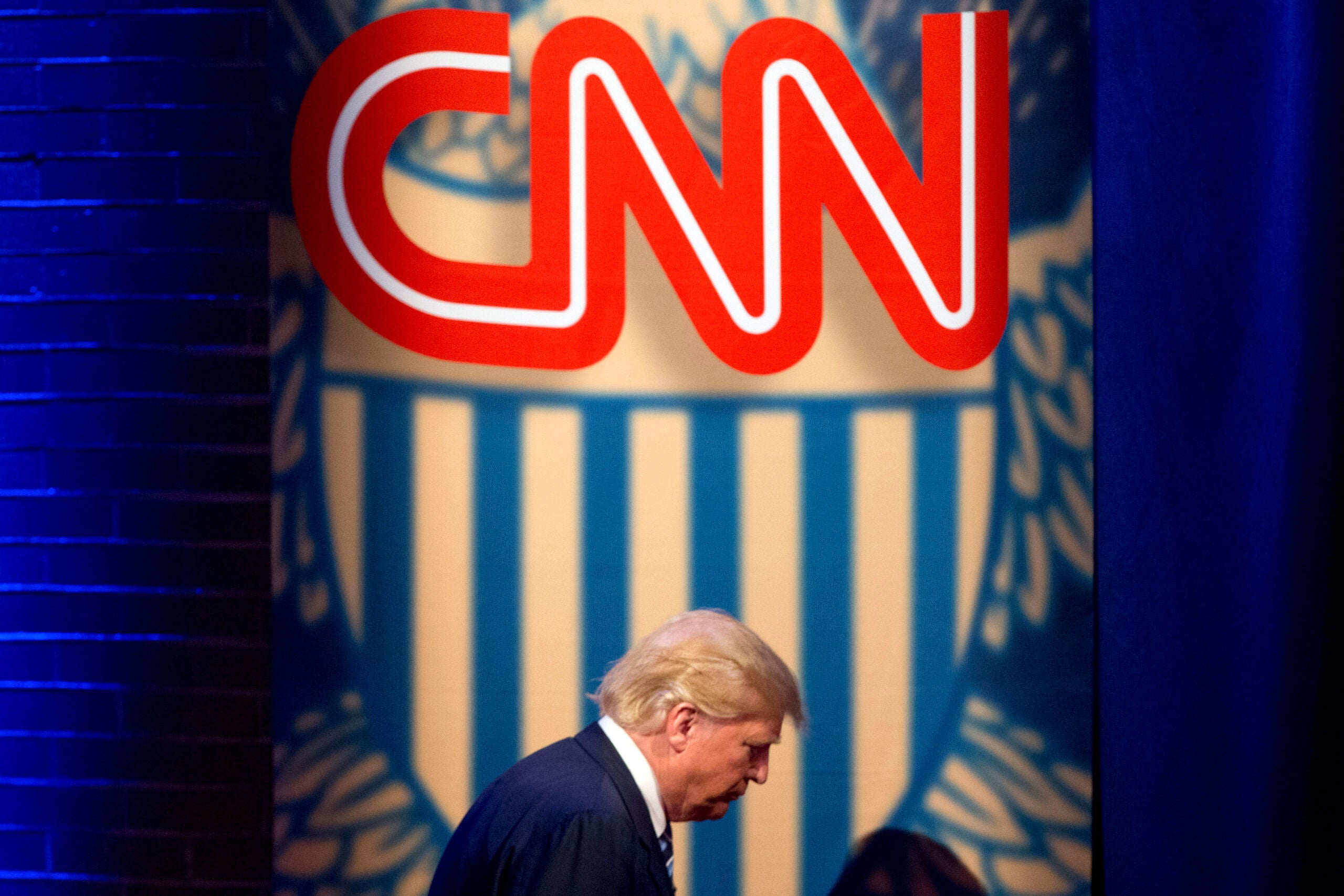FILE - Then-Republican presidential candidate Donald Trump arrives for a CNN town hall at the University of South Carolina in Columbia, S.C., Feb. 18, 2016.
