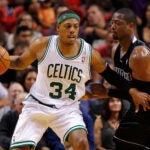 Paul Pierce #34 of the Boston Celtics posts up Dwyane Wade #3 of the Miami Heat during a game at American Airlines Arena on April 10, 2012 in Miami, Florida.