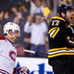 Milan Lucic #17 of the Boston Bruins celebrates his empty-net goal in the third period against the Montreal Canadiens in Game Two of the Second Round of the 2014 NHL Stanley Cup Playoffs at TD Garden on May 3, 2014 in Boston, Massachusetts.