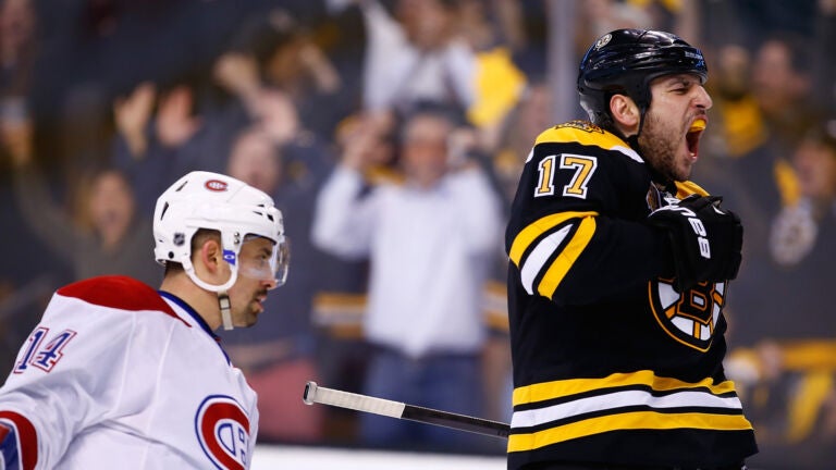 Milan Lucic #17 of the Boston Bruins celebrates his empty-net goal in the third period against the Montreal Canadiens in Game Two of the Second Round of the 2014 NHL Stanley Cup Playoffs at TD Garden on May 3, 2014 in Boston, Massachusetts.