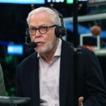 01-23-19: Boston, MA: Boston Celtics television play by play announcer Mike Gorman (right) is pictured as he does the pre game show with his partner Brian Scalabrine (left) at the TD Garden before a Celtics victory over the Cleveland Cavaliers.
