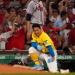 Boston Red Sox left fielder Masataka Yoshida (7) reacts after was the third out in a rare third inning triple play. The Boston Red Sox host the Atlanta Braves on July 25, 2023 at Fenway Park in Boston, MA.
