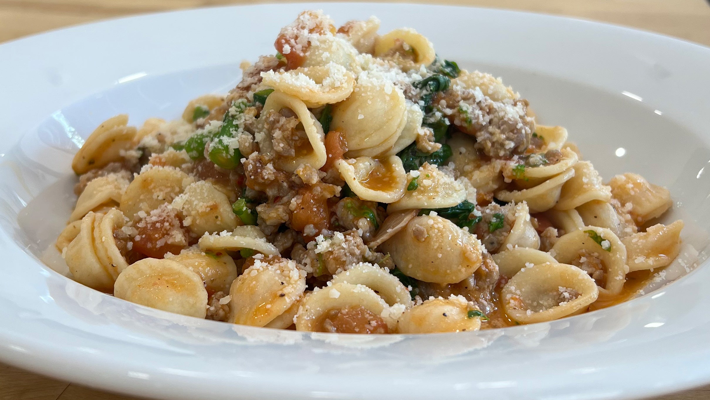 Stella's orecchiette pasta with Italian sausage, garlic, tomatoes, Parmesan, and parsley.