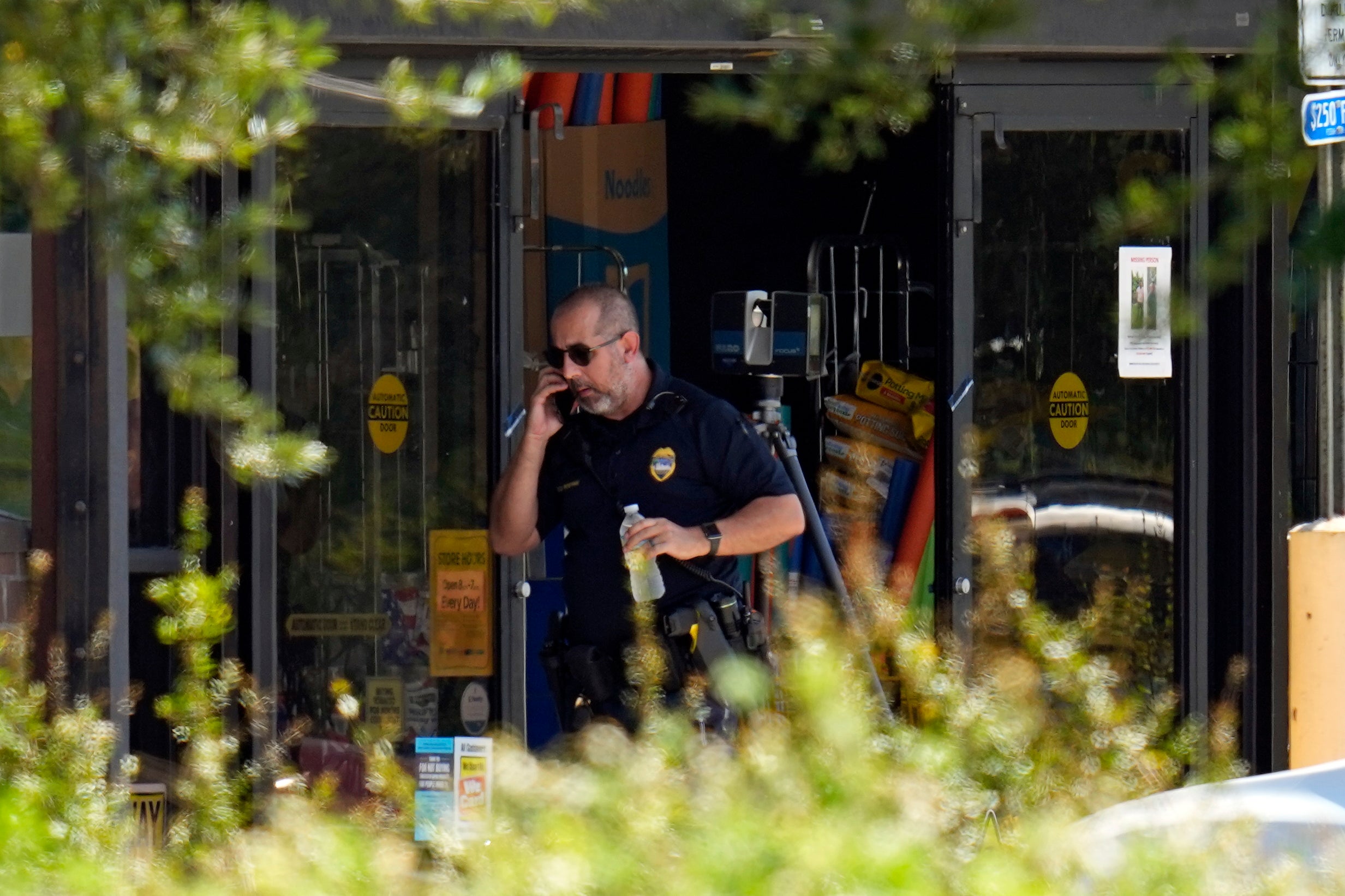 Law enforcement officials seen investigating at a Dollar General Store in Jacksonville, Fla.