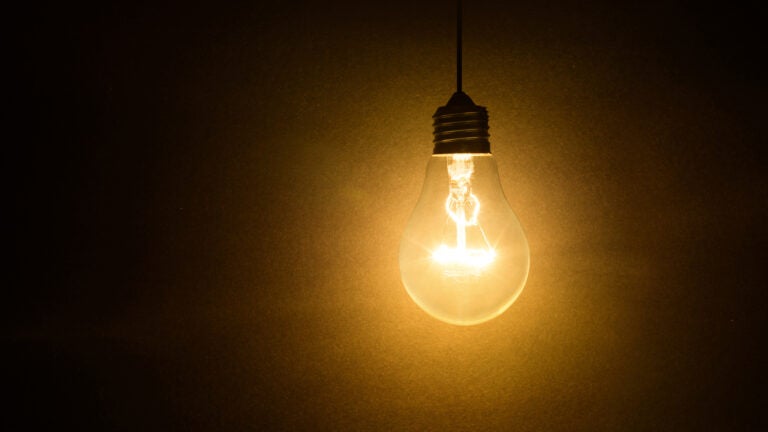light bulb on dark background, concept of creativity.
