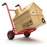 Delivery or moving houseconcept. Hand truck with cardboard box as home isolated on white. 3d millennials