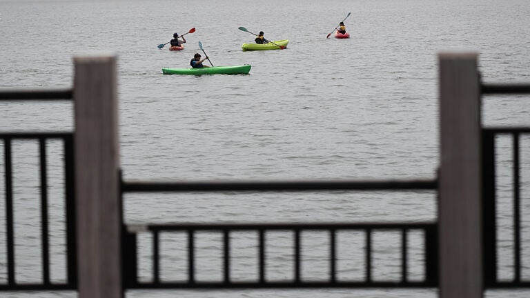Boston weather -- Natick, Ma., 07/24/2023, At Cochituate State Park, visitors stay cool in kayaks in the heat.