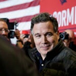 Dave McCormick, a Republican candidate for U.S. Senate in Pennsylvania, meets with attendees.