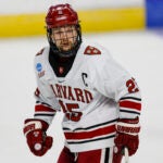 Harvard University forward John Farinacci (25) skates during the second period of an NCAA hockey game against Ohio State on Friday, March 24, 2023, in Bridgeport, Conn.