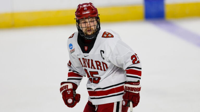 Harvard University forward John Farinacci (25) skates during the second period of an NCAA hockey game against Ohio State on Friday, March 24, 2023, in Bridgeport, Conn.
