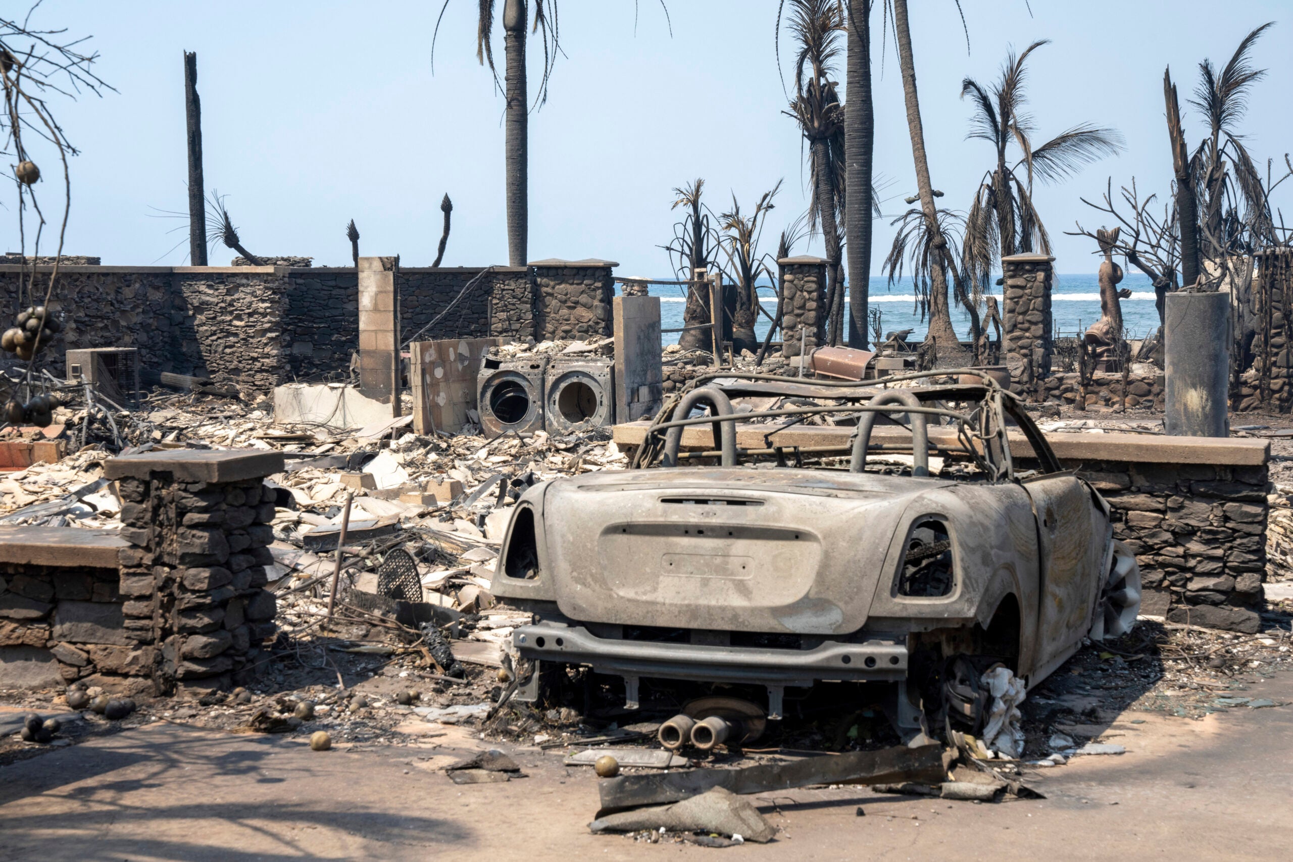 Wildfire wreckage is seen Wednesday, Aug. 9, 2023, in Lahaina, Hawaii.