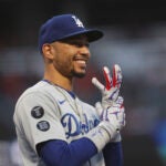 Los Angeles Dodgers right fielder Mookie Betts smiles before Game 1 of a baseball National League Division Series against the San Francisco Giants Friday, Oct. 8, 2021, in San Francisco.