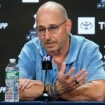 New York Yankees general manager Brian Cashman gestures while speaking during a news conference.