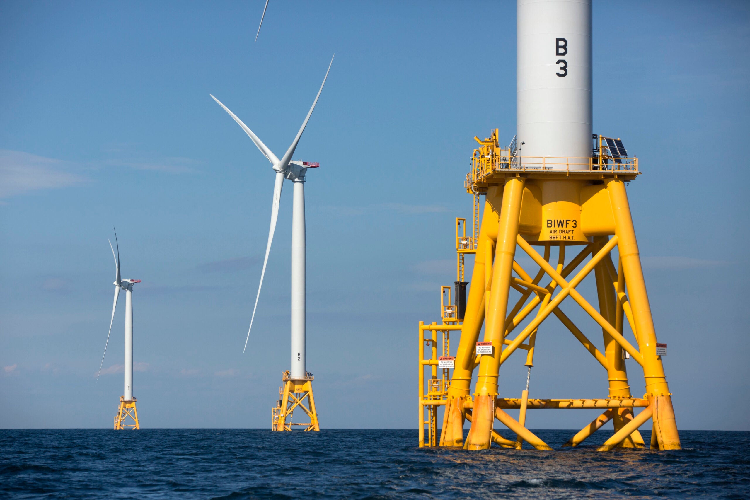 FILE - Three wind turbines from Deepwater Wind stand in the water off Block Island, R.I, the nation's first offshore wind farm, Aug. 15, 2016.