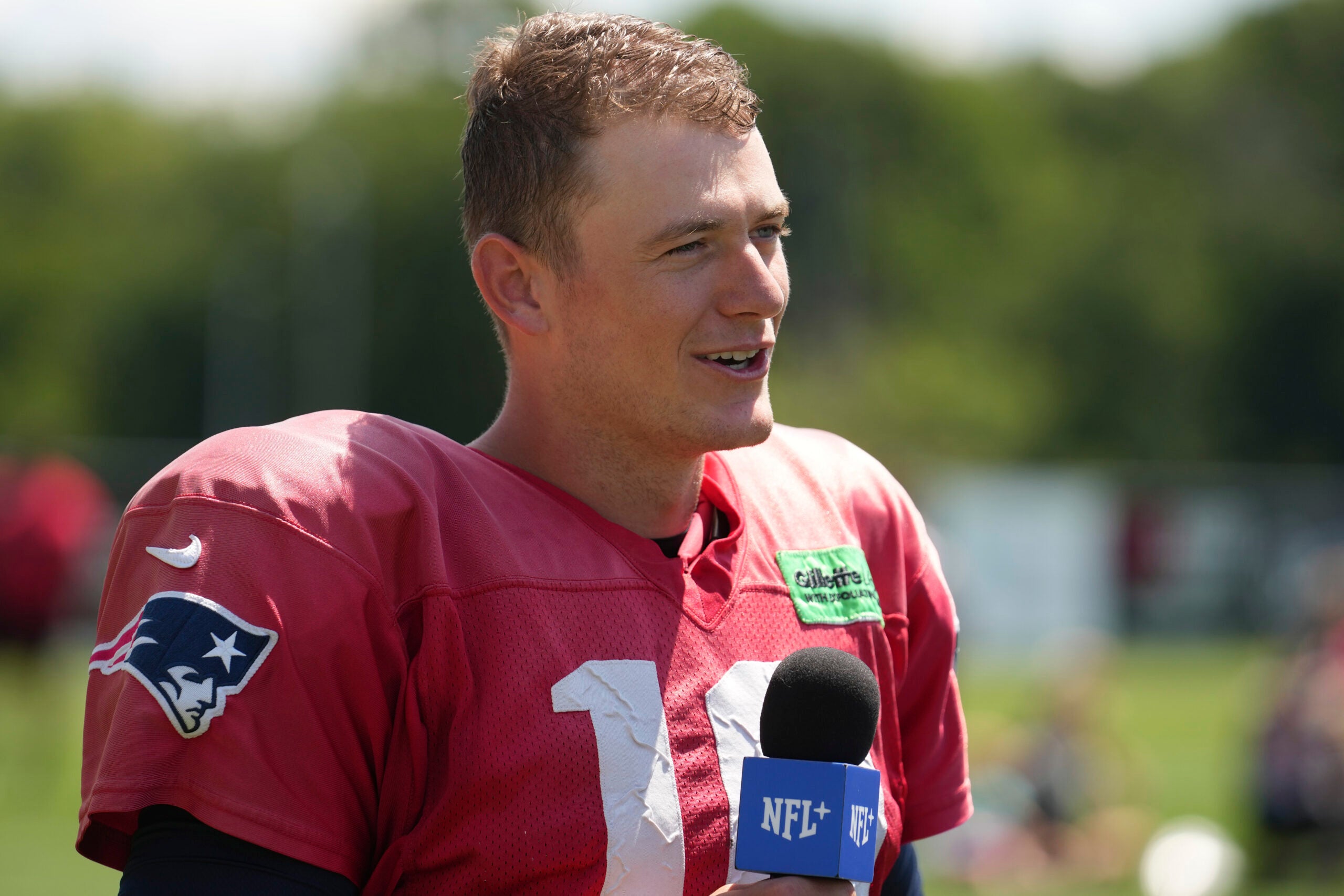 Patriots quarterback Mac Jones serves up ice cream in Boston