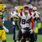 New England Patriots wide receiver Kendrick Bourne (84) reacts after making a catch for a first down during a preseason NFL football game between the New England Patriots and Green Bay Packers Saturday, Aug. 19, 2023, in Green Bay, Wis.