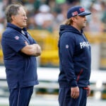 New England Patriots Head coach Bill Belichick, left and son Stephen Belichick before a preseason NFL football game against the Green Bay Packers Saturday, Aug. 19, 2023, in Green Bay, Wis.