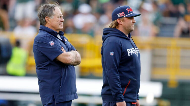 New England Patriots Head coach Bill Belichick, left and son Stephen Belichick before a preseason NFL football game against the Green Bay Packers Saturday, Aug. 19, 2023, in Green Bay, Wis.