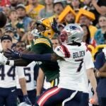 Green Bay Packers wide receiver Romeo Doubs (87) catches a pass against New England Patriots cornerback Isaiah Bolden (7) during the first half of a preseason NFL football game, Saturday, Aug. 19, 2023, in Green Bay, Wis.