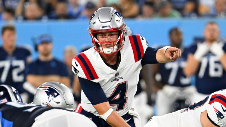 New England Patriots quarterback Bailey Zappe (4) plays against the Tennessee Titans during an NFL preseason football game Saturday, Aug. 26, 2023, in Nashville, Tenn.