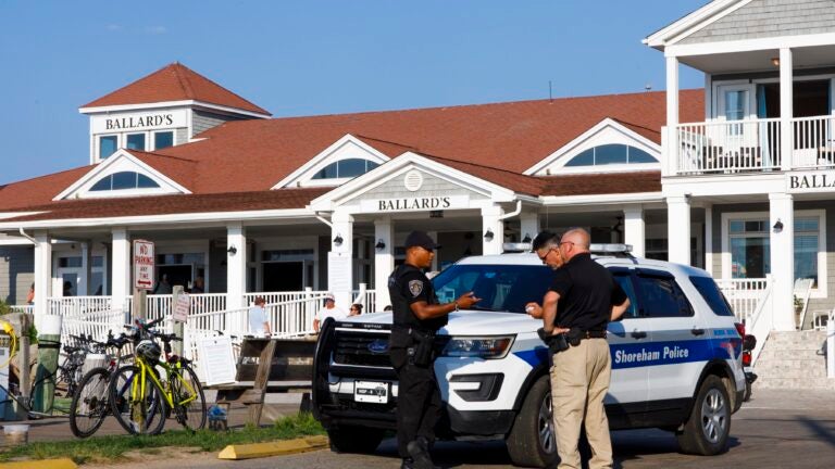 New Shoreham Police outside of Ballard's Beach Resort, a popular bar destination for day trippers located near the ferry docks on Block Island, R.I., on August 27, 2022.