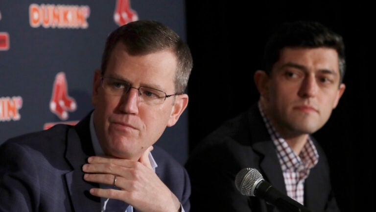 In this Jan. 15, 2020, file photo, Boston Red Sox team CEO Sam Kennedy, left, and Chief Baseball Officer Chaim Bloom participate during a news conference at Fenway Park in Boston.