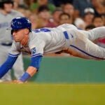 Kansas City Royals' Drew Waters scores on a double by Kyle Isbel during the seventh inning.