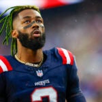 New England Patriots cornerback Jalen Mills (2) reacts during pregame of an NFL pre-season football game against the Houston Texans, Thursday, Aug. 10, 2023, in Foxborough, Mass.