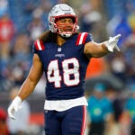 New England Patriots linebacker Jahlani Tavai (48) warms up during pregame of an NFL pre-season football game against the Houston Texans, Thursday, Aug. 10, 2023, in Foxborough, Mass.