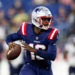 New England Patriots quarterback Malik Cunningham (16)scrambles out of the pocket during the second half of an NFL pre-season football game against the Houston Texans, Thursday, Aug. 10, 2023, in Foxborough, Mass.