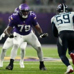 Minnesota Vikings offensive tackle Vederian Lowe (79) looks to block during the first half of an NFL football game against the Tennessee Titans, Saturday, Aug. 19, 2023, in Minneapolis.