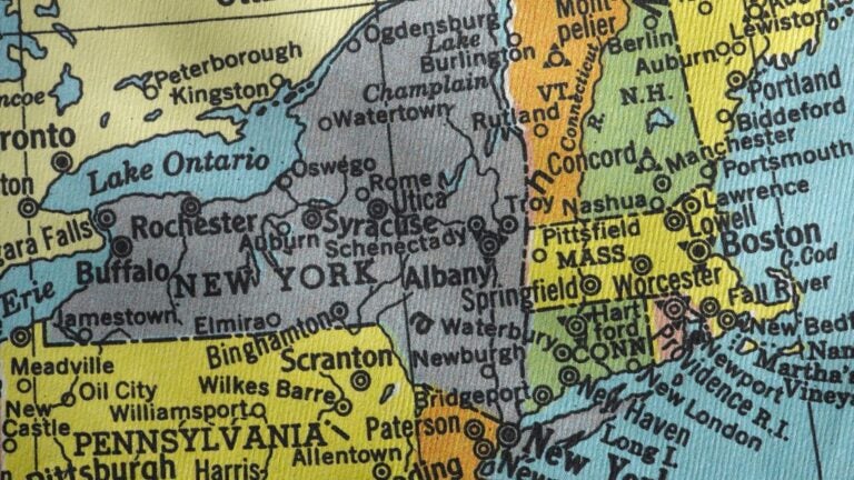 A colorful map of New England with New York, Pennsylvania, New Jersey visible surrounding it.